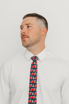 DAZI Forest Fleet Tie worn with a white shirt.