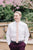 Pale Pink Tie worn with a white shirt and plum purple suit.