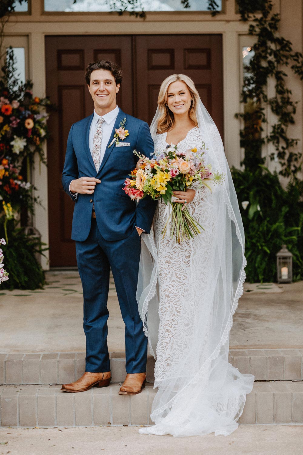 Quicksand Roses tie worn with a white shirt and blue suit.