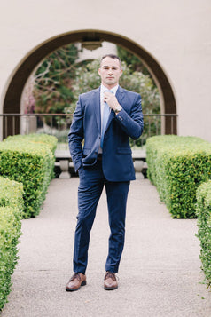 Twilight tie worn with a white shirt and blue suit.