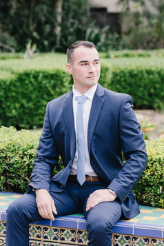 Twilight tie worn with a white shirt and blue suit.