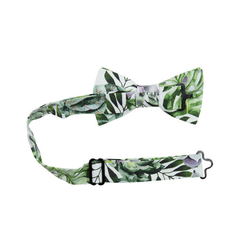 Aloe Pre-Tied Bow Tie with adjustable neck strap. White background with big green succulents and leaves, and also purple succulents.