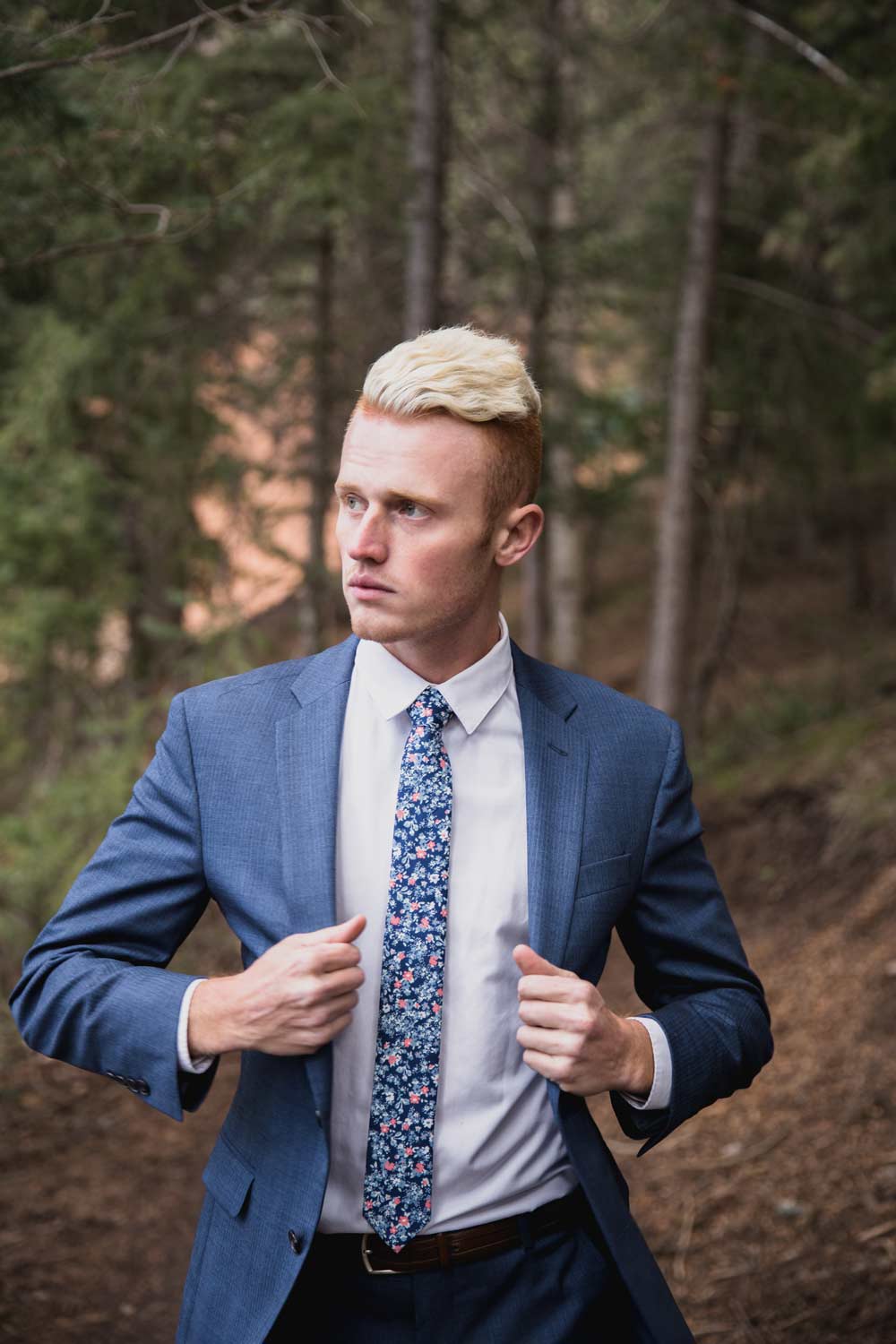 Atlanta tie worn with a white shirt and blue suit jacket. 