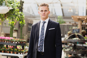 First Date tie worn with white shirt and dark navy suit jacket. 