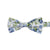 Frisco Pre-Tied Bow Tie. White background with small and medium size light blue flowers and sage green leaves.