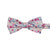 Hermosa Pre-Tied Bow Tie. Cream/off white background with pink and peach circular flowers and blue and green leaves throughout.