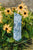 Indie Skye tie hanging from a couple of sunflowers.