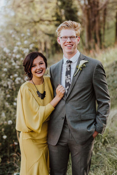 Nightfall tie worn with a white shirt and charcoal gray suit.