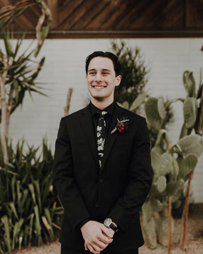 Nightfall tie worn with a black shirt and black suit.